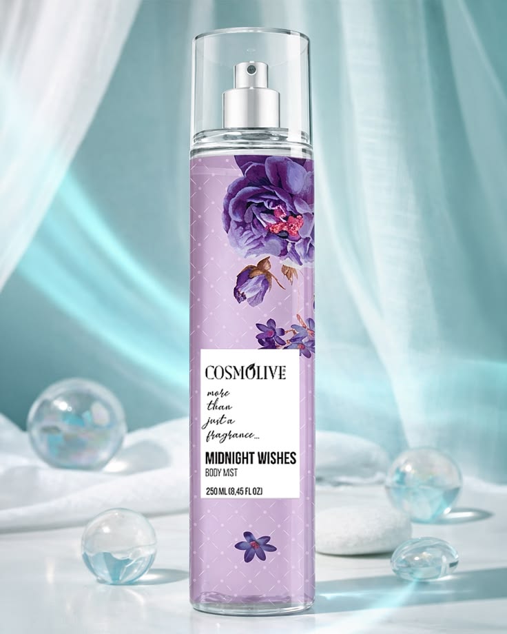 Cosmolive Midnight Wishes body mist bottle with floral design on a light background