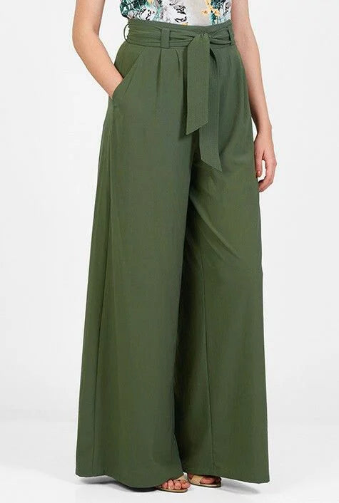 Green wide-leg pants with a tie waist on a white background
