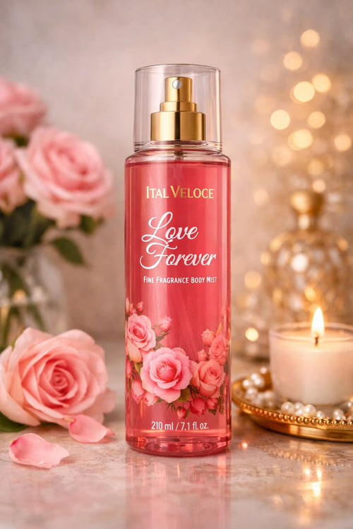 Ital Veloce Love Forever fragrance body mist with pink roses and a candle in the background