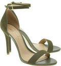 straps on a Green high-heeled sandals with thin white background